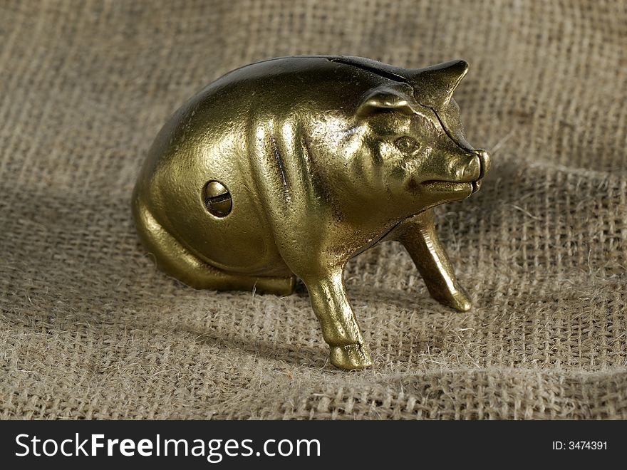 Photo of a Brass Piggy Bank - Finance Related. Photo of a Brass Piggy Bank - Finance Related