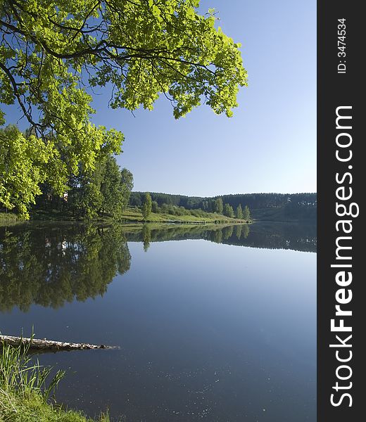 Early morning on coast of small lake. Early morning on coast of small lake