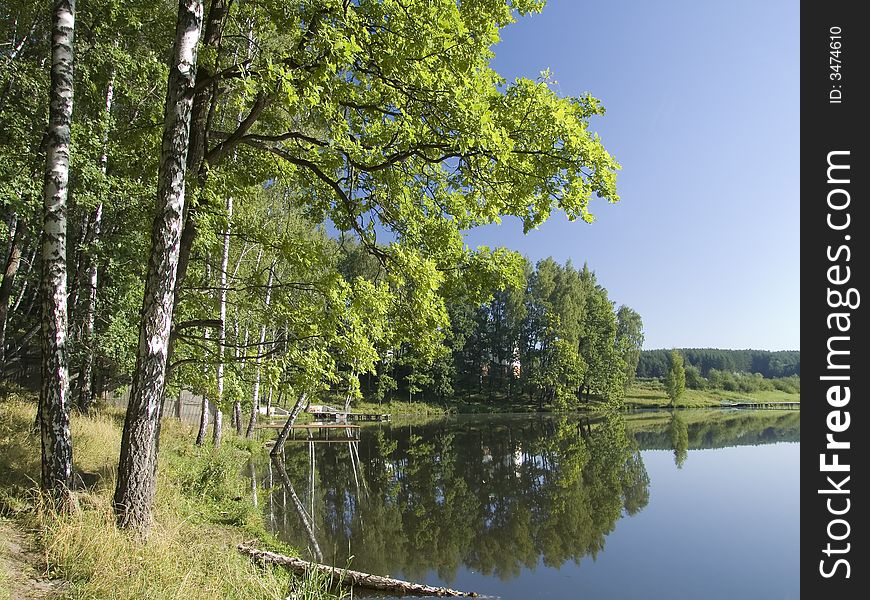 Early morning on coast of small lake. Early morning on coast of small lake