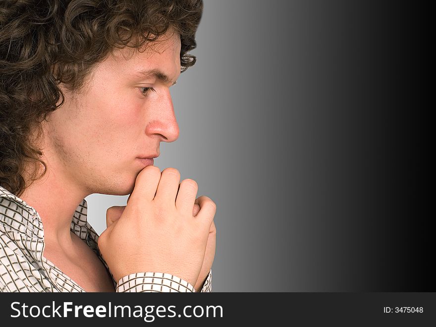 Portrait serious men on a Grey background. Portrait serious men on a Grey background