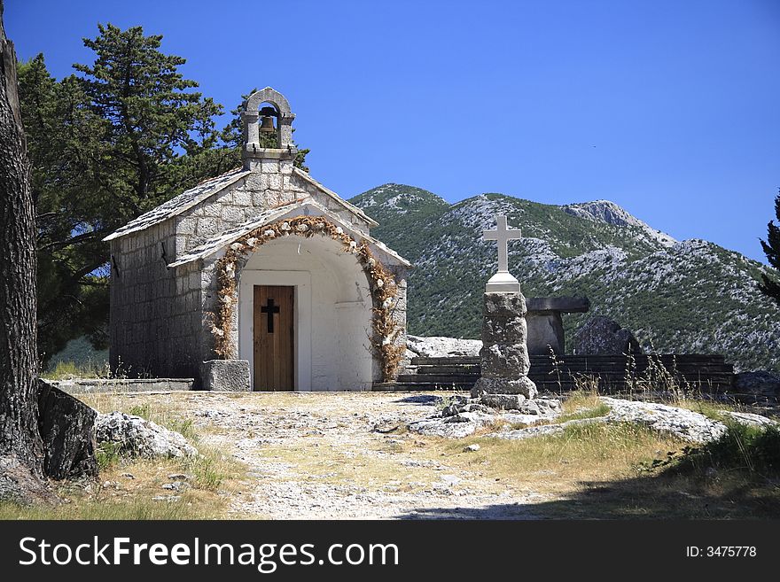 Croatian chapel with cross and table