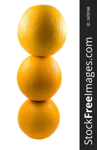 Three oranges isolated on white background