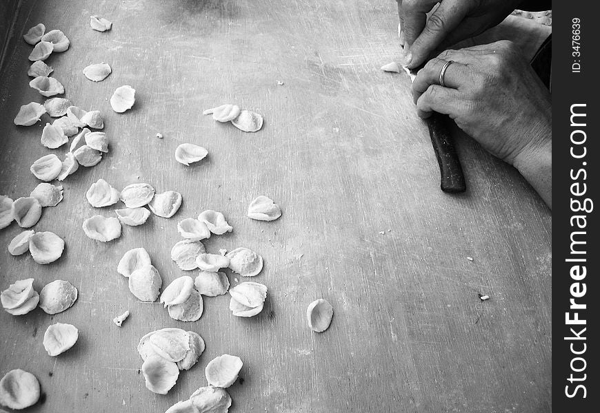 This kind of italian pasta is called orecchietta.... typical pasta from Bari, city in Puglia: region of the south of Italy. Everyone who ate them loves them.