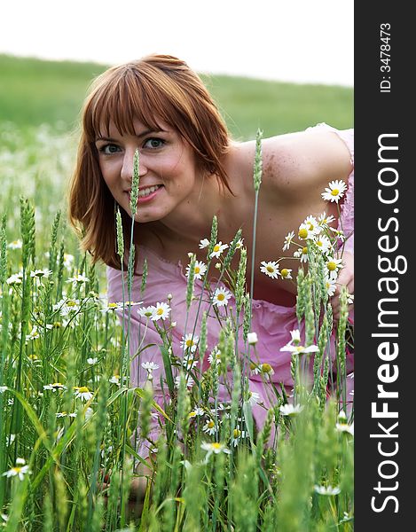 The beautiful girl on a meadow