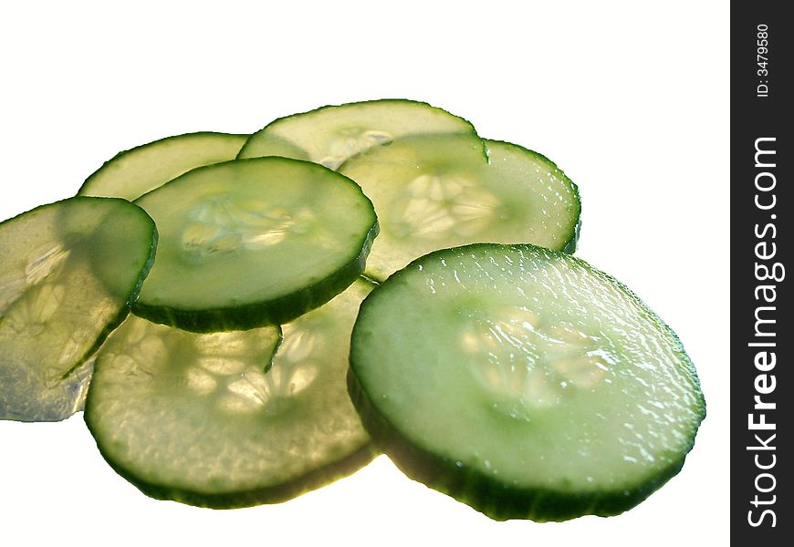 thinly cucumber slices, isolated on white