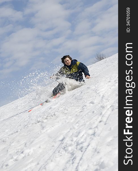 Skier falling on a steep snow slope. Skier falling on a steep snow slope