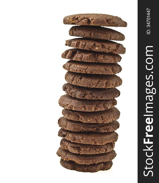 Inclined hight tower cookie before falling on white background. Inclined hight tower cookie before falling on white background