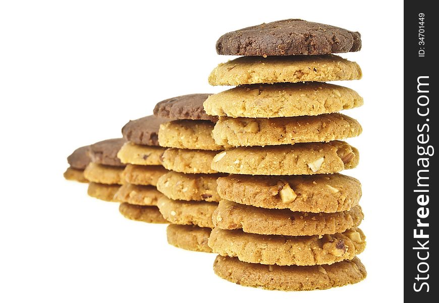 Perspective of cookie stack chart with brown cookie on top on white background. Perspective of cookie stack chart with brown cookie on top on white background