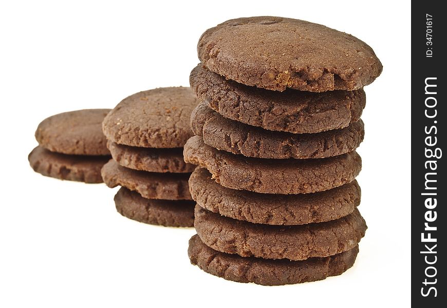 Perspective of three step stack of chocolate cookie on white background. Perspective of three step stack of chocolate cookie on white background