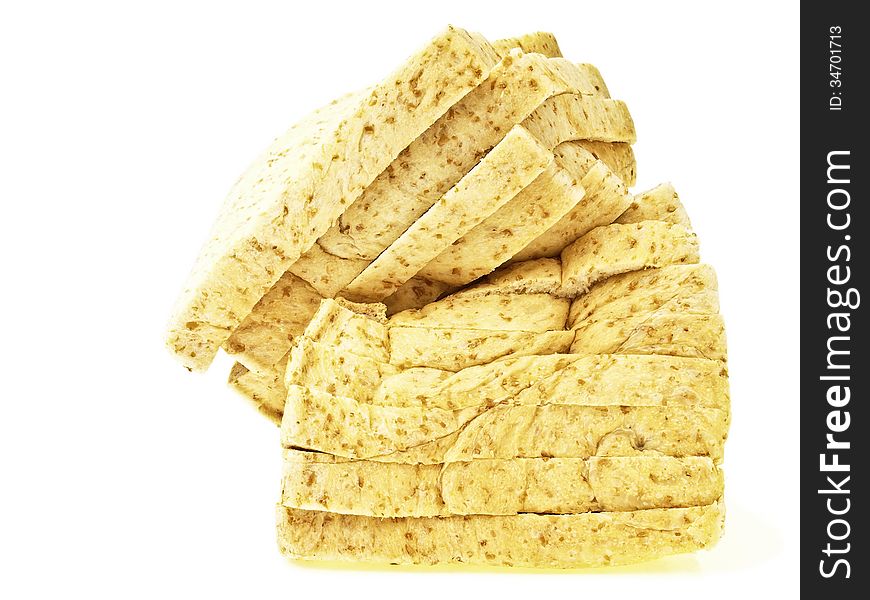 Side view of damage sliced bread on white background