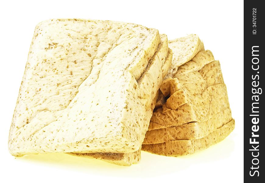 Pile of damage loaf sliced bread on white background. Pile of damage loaf sliced bread on white background