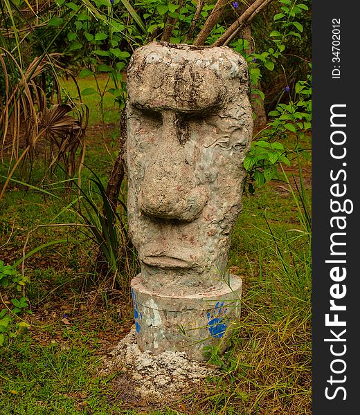 A mad statue head in the woods of Florida. A mad statue head in the woods of Florida.