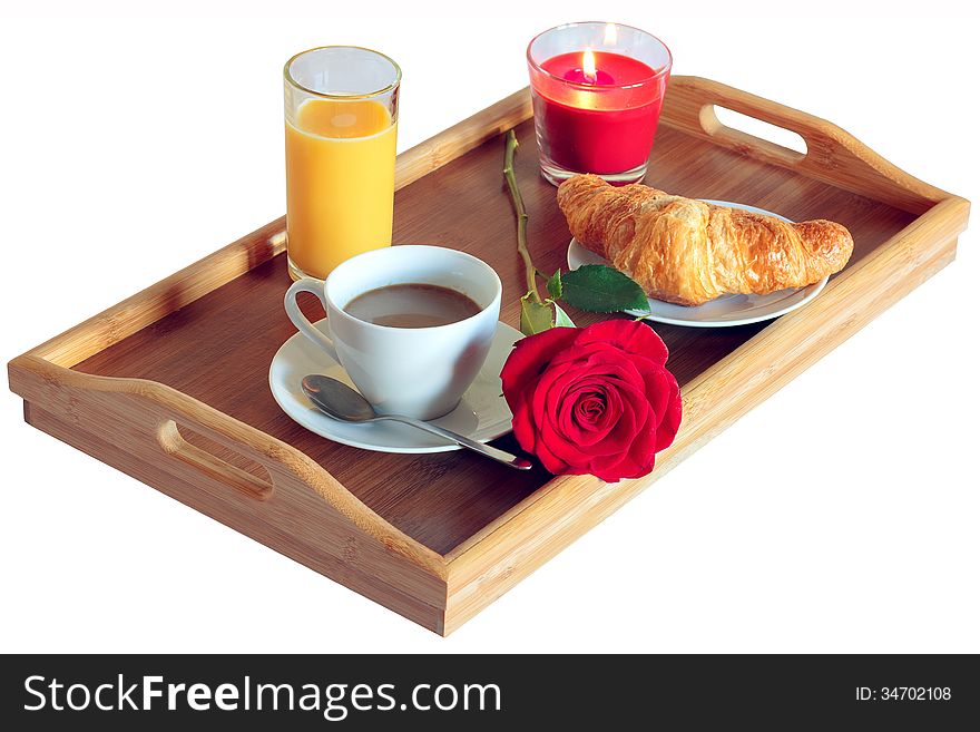 Breakfast table with orange juice, croissant and coffee. Breakfast table with orange juice, croissant and coffee