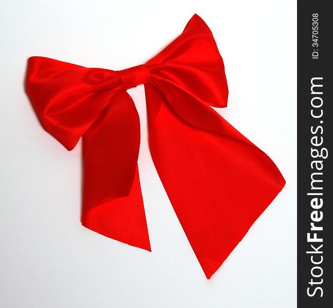 Red big bow on the white background