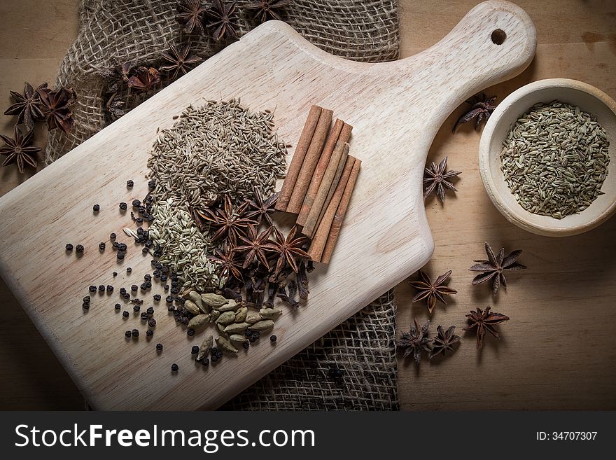 Cooking ingredients,spices on wooden table. Cooking ingredients,spices on wooden table