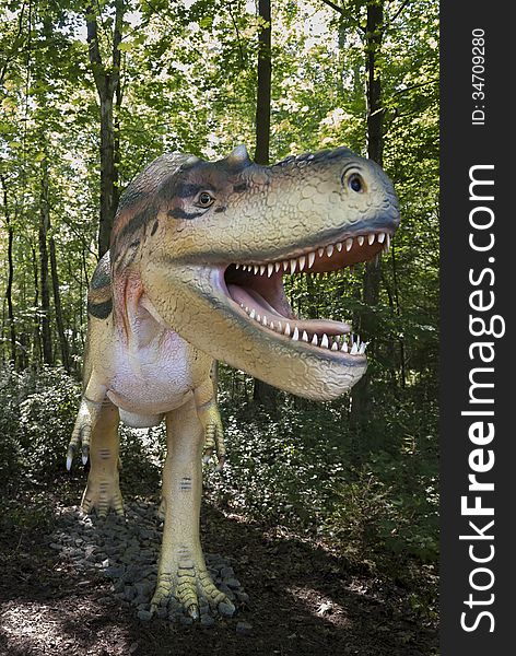 Jurassic park - sculpture of dinosaur (tyrannosaur) in live size. Jurassic park - sculpture of dinosaur (tyrannosaur) in live size.