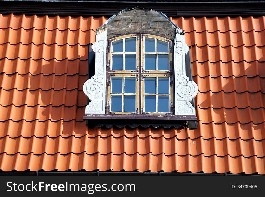 Dormer roof window, in a tiled roof. Dormer roof window, in a tiled roof