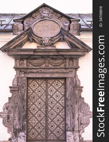 Old door , back entrance to the church St. Peter and Paul in Krakow . Poland