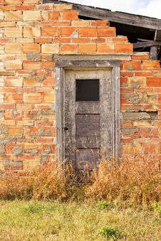 A Partial Brick Wall With A Grey Door Stock Images A Partial Brick Wall With A Grey Door Stock Images