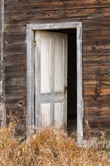 A White Wood Door Standing Ajar Royalty Free Stock Images