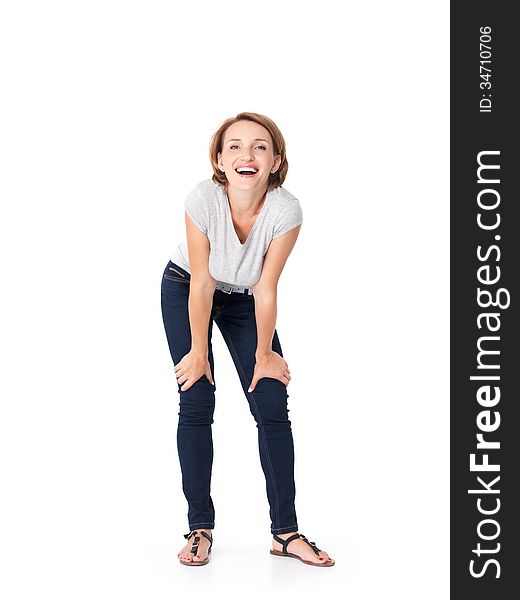 Full portrait of the beautiful happy woman stands at studio on white background. Full portrait of the beautiful happy woman stands at studio on white background