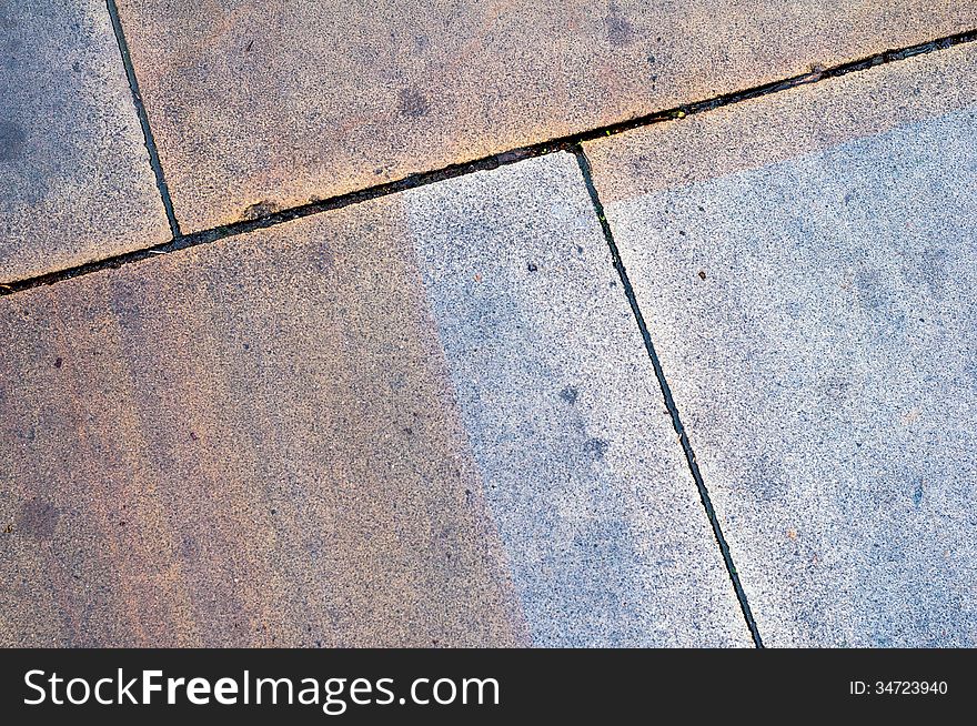 Stained & Marked Wet Paving Slabs with Diagonal Edges. Stained & Marked Wet Paving Slabs with Diagonal Edges