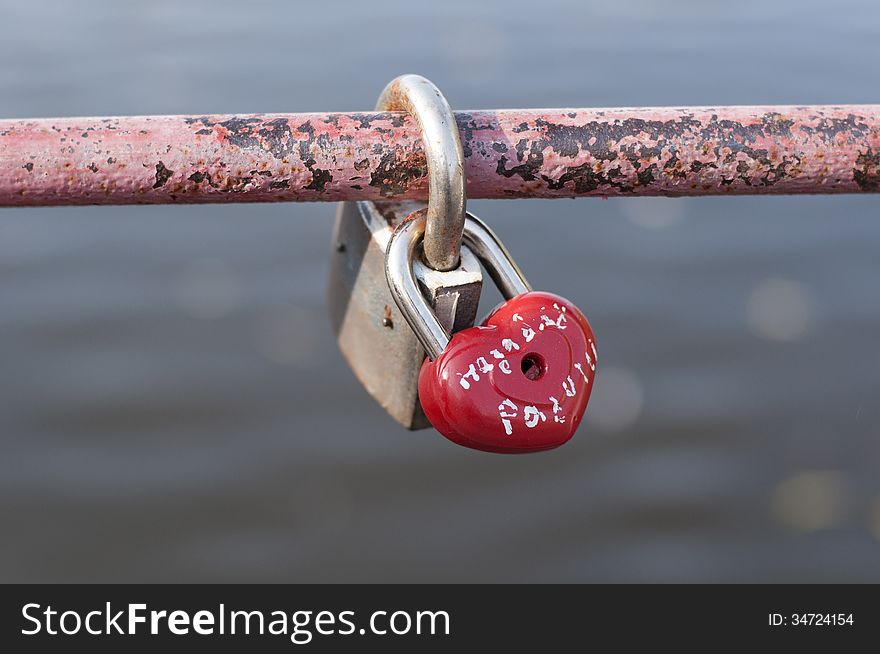 Padlock red heart-shaped. Love concept