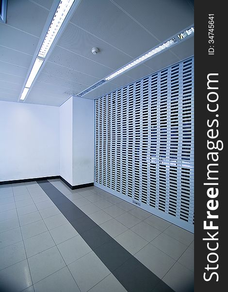 Empty blue hall in office centre, Spain