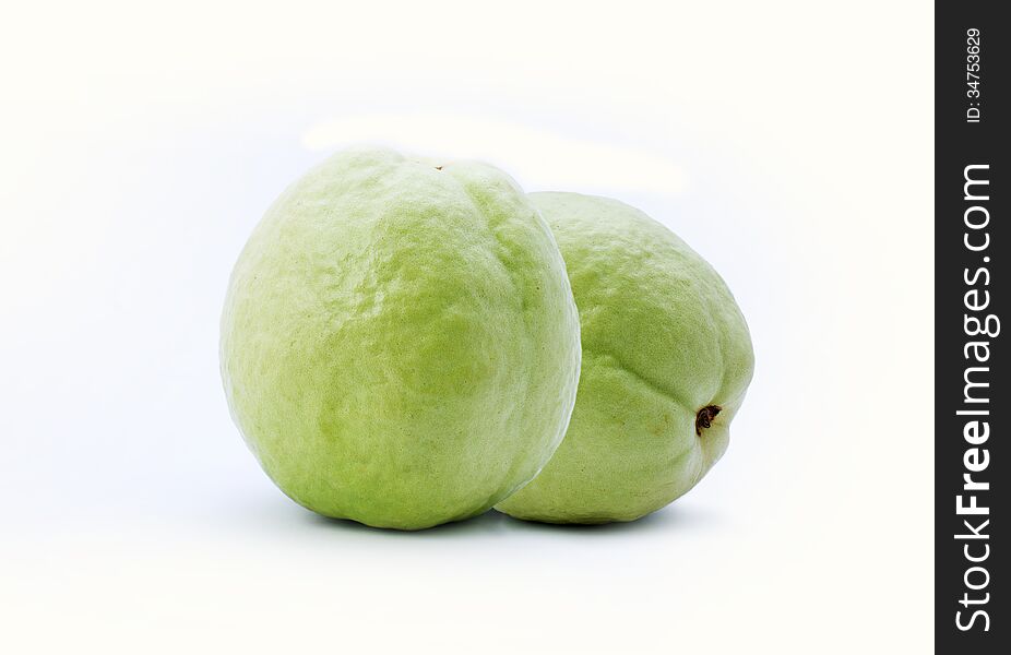 Guava fruit on chopping board with clean white background