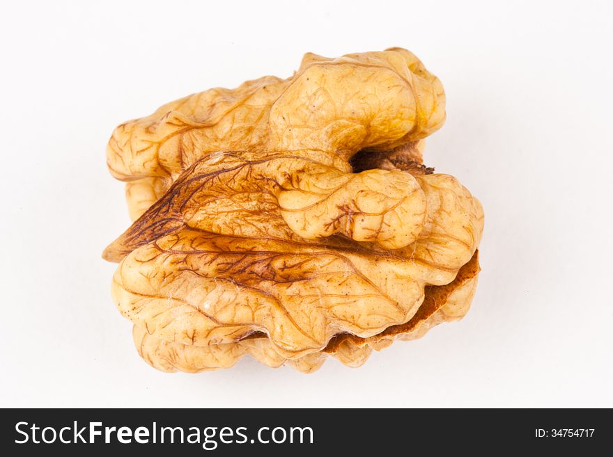 Walnut on white background looking like a chicken