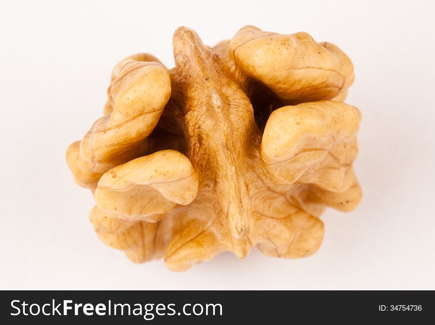 Walnut on white background looking like a chicken