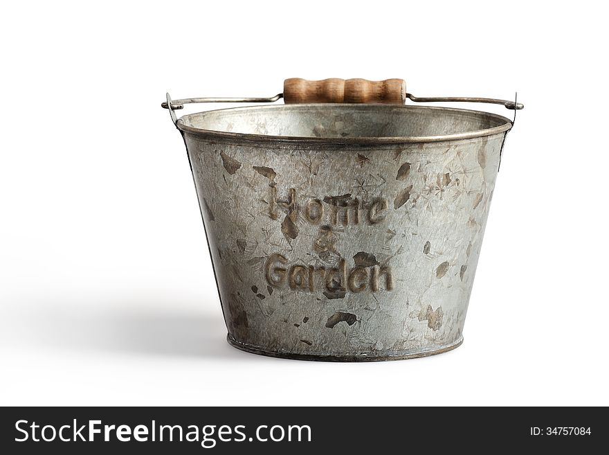 Tin bucket for home and garden on a white background with clipping path. Tin bucket for home and garden on a white background with clipping path