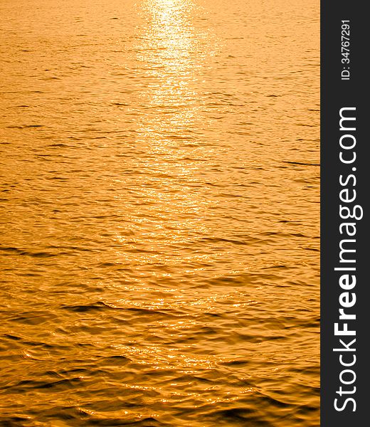 Reflective sun on water abstract background