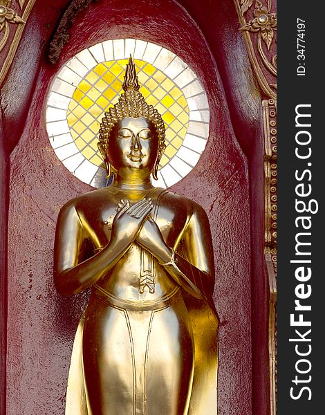 Gold buddha statue mirror background