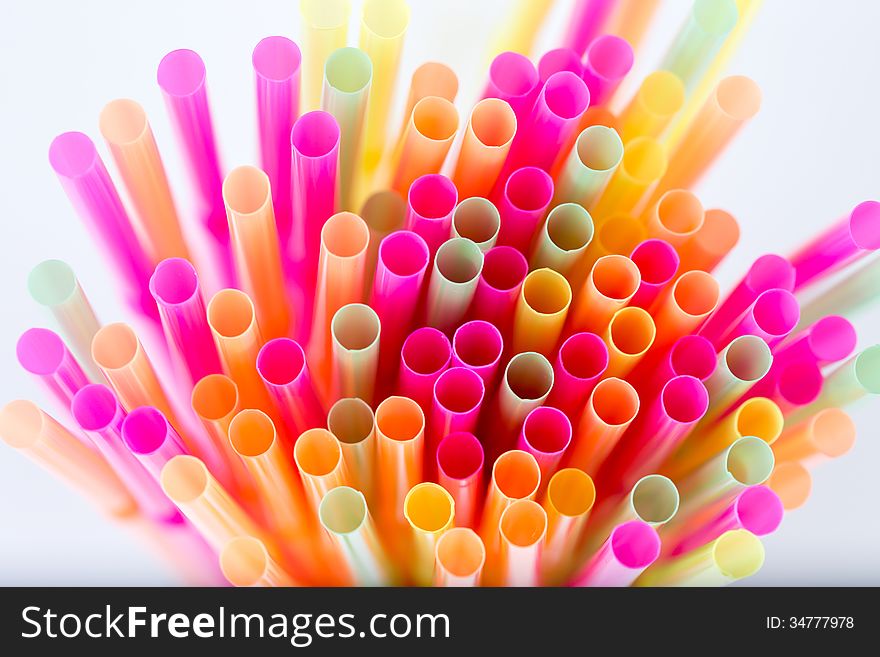 Many colorful cocktail tubes background