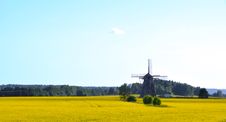 Old Mill In Oilseed Rape Field Royalty Free Stock Photos