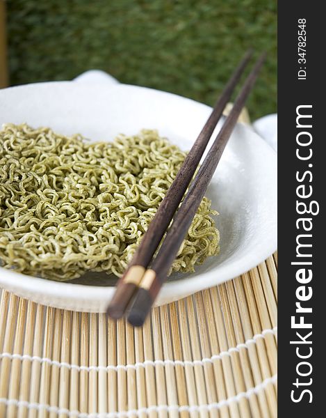 Instant noodle in bowl with chopstick