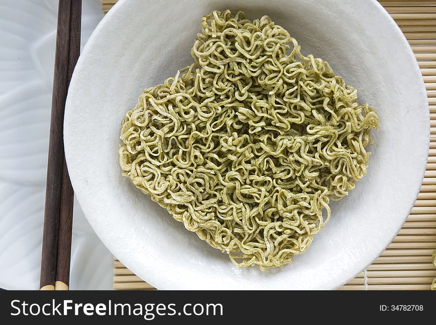 Vegetable instant noodle uncooked in bowl