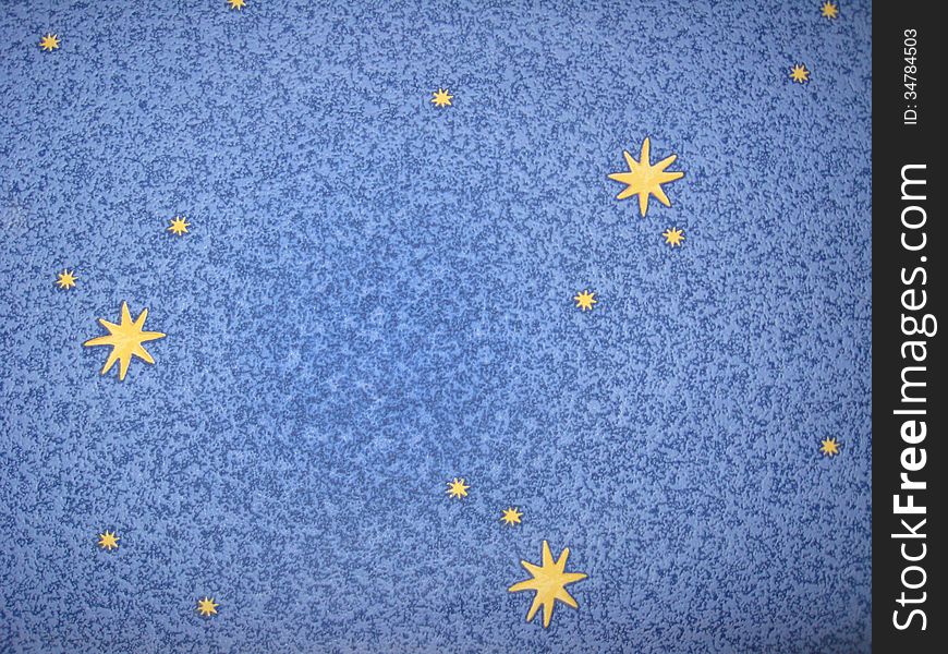 The image of the blue background with yellow stars