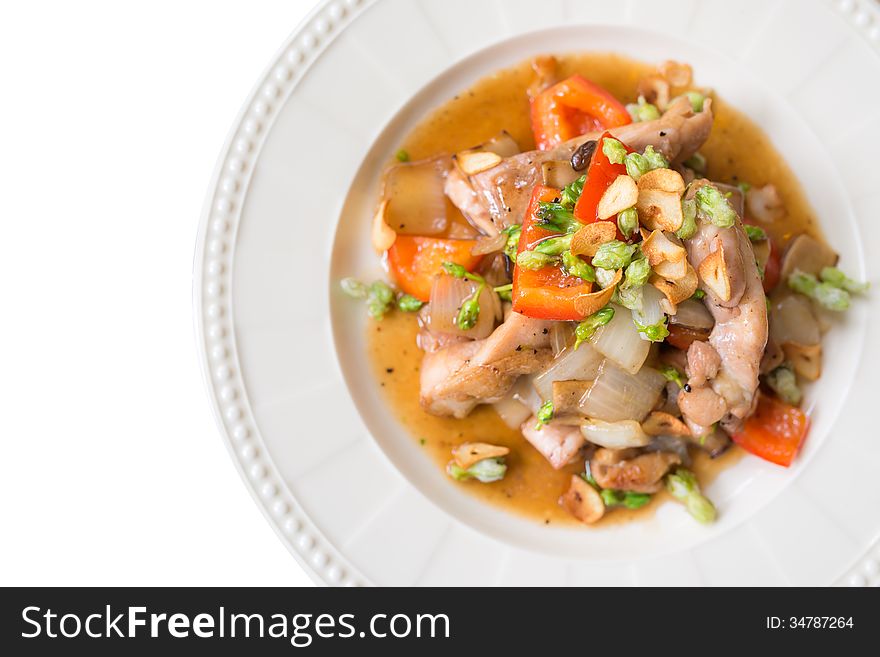 Chicken pan fried with onions vegetable sauce, isolated on white background. Chicken pan fried with onions vegetable sauce, isolated on white background