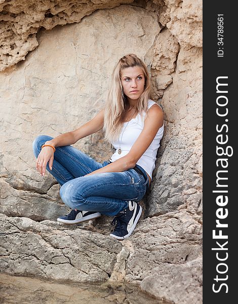 Beautiful young woman in rocks. Beautiful young woman in rocks