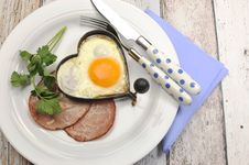 Ham With Heart Shape Egg Cooked Breakfast Stock Images
