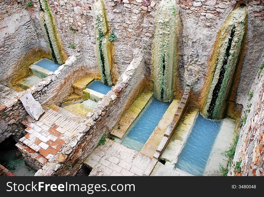 The ruins ancient thermal Roman bath
in Tuscaby with sulphurated water. The ruins ancient thermal Roman bath
in Tuscaby with sulphurated water