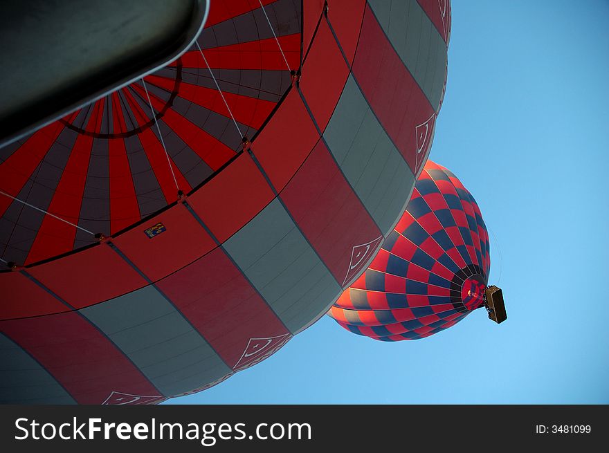 Sunrise, 2 hot air balloons over Cappadocia,  Turkey