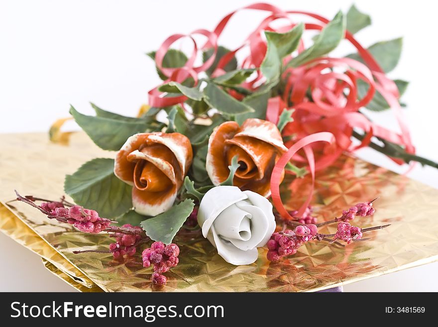 Composition with flowers on a light background.