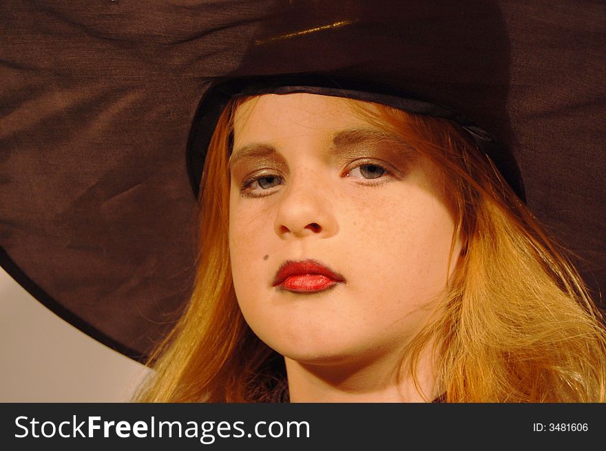Young girl as witch