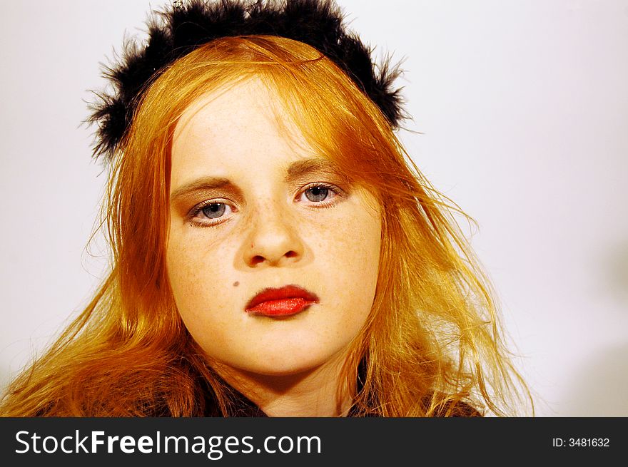 Young girl with black tiara on head. Young girl with black tiara on head