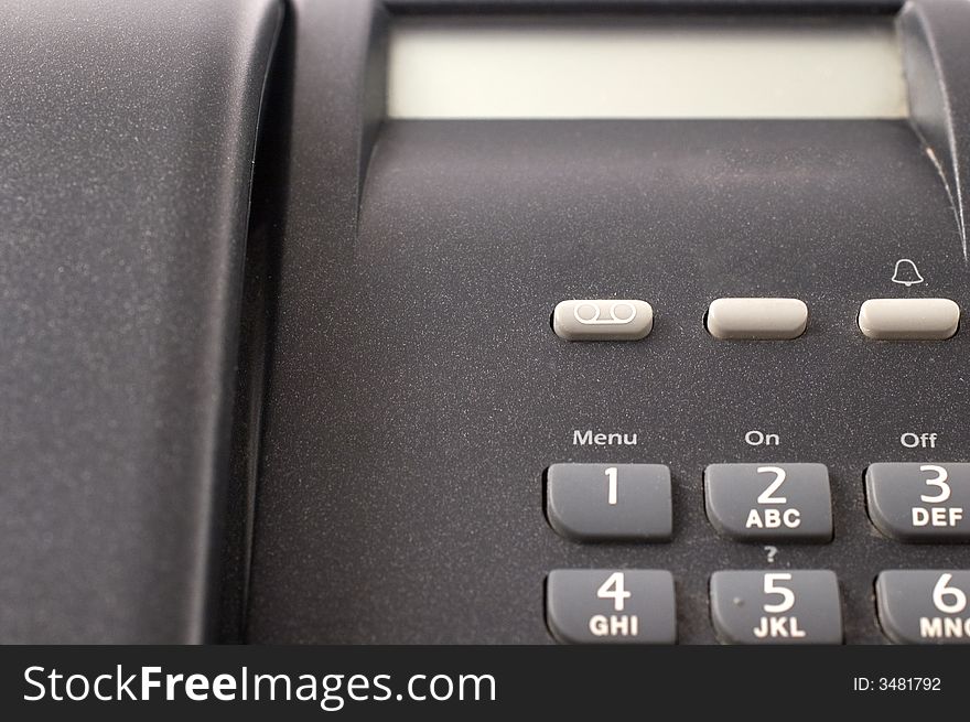 Black telephone detail with numbers and blank display