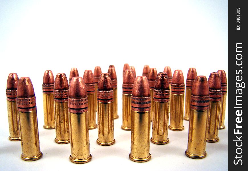 A group of small bullets in a forest like position.