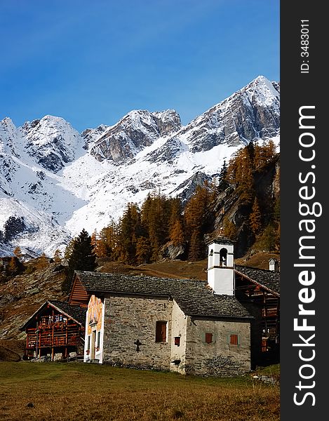 Small church of a mountain village; west alps, Italy. Small church of a mountain village; west alps, Italy